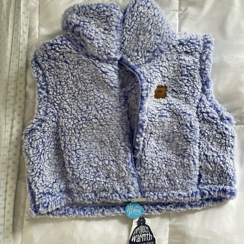 Turtlefur brand new vest. Never been worn.